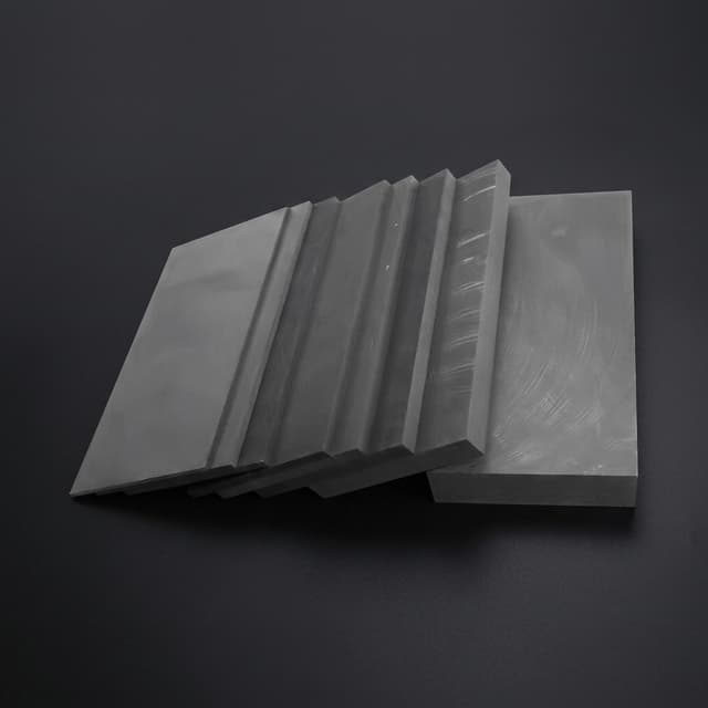 Isostatic graphite blocks and ultra-fine grain grades